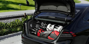An open trunk of a 2024 Honda Accord Hybrid, filled with golf clubs and parked near Ontario, CA.